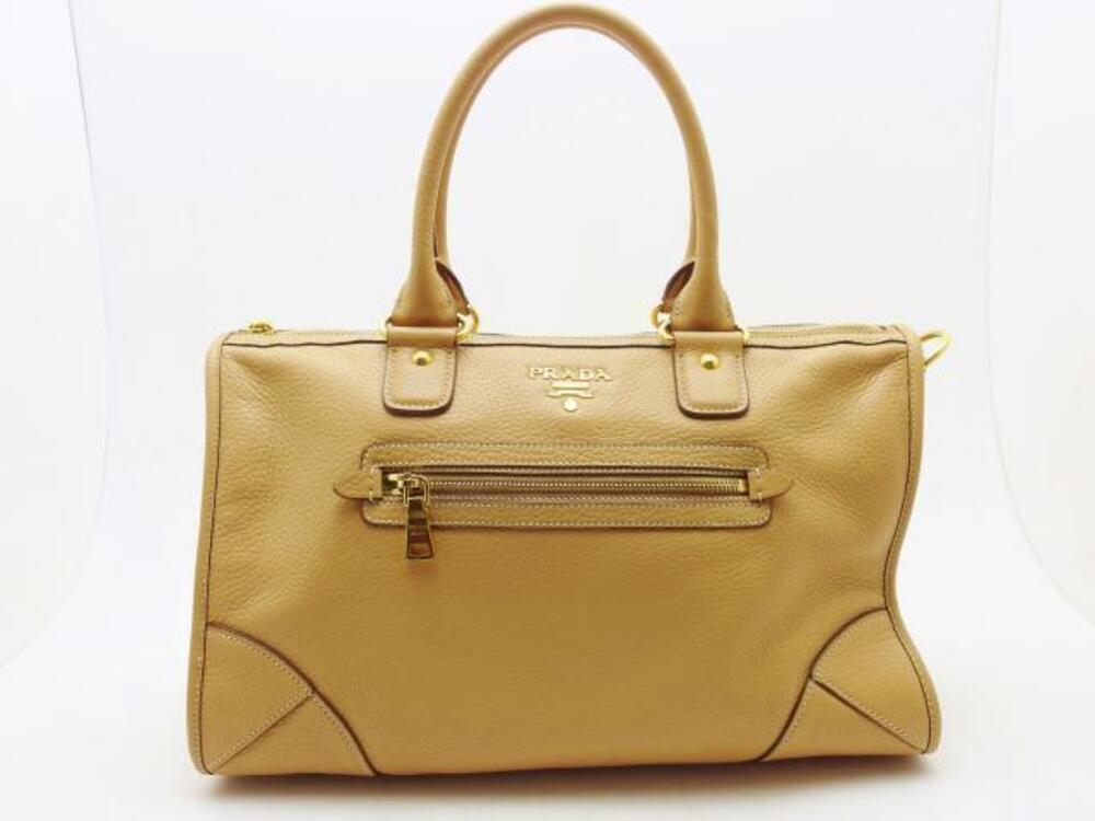 Prada Vitello Daino leather top handle bag horizontal zipper pocket Brown